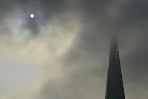 The sun begins to shine through morning fog next to the Shard in central London The sun begins to shine through morning fog next to the Shard in central London