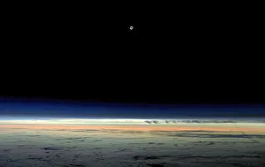 The sun is obscured by the moon during a solar eclipse as seen from an Alaska Airlines The sun is obscured by the moon during a solar eclipse as seen from an Alaska Airlines
