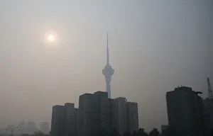 The sun is seen above buildings during a heavily hazy day in Beijing The sun is seen above buildings during a heavily hazy day in Beijing