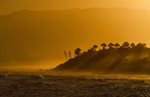 The sun sets at Cabopino beach in southern Spain The sun sets at Cabopino beach in southern Spain
