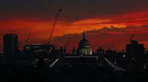Sunset is seen behind St Pauls Cathedral in London Sunset is seen behind St Pauls Cathedral in London