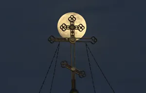 A supermoon rises behind the cross of the Saint Nicholas cathedral in Yevpatoriya A supermoon rises behind the cross of the Saint Nicholas cathedral in Yevpatoriya