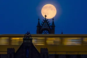 The supermoon rises behind Oberbaum Bridge as a train passes through in Berlin The supermoon rises behind Oberbaum Bridge as a train passes through in Berlin