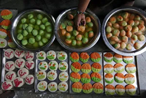 Sweets featuring election symbol of different Indian political parties are pictured Sweets featuring election symbol of different Indian political parties are pictured