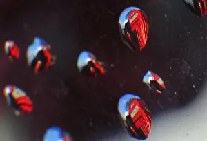 Telephone boxes are reflected in raindrops in central London Telephone boxes are reflected in raindrops in central London