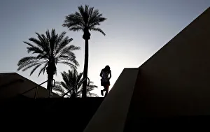 A tennis fan walks up the gangway leading into the main stadium at the Indian Wells A tennis fan walks up the gangway leading into the main stadium at the Indian Wells