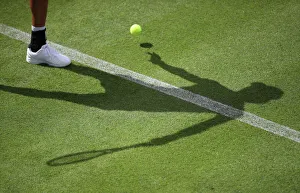 Tennis - General view of the shadow of a competitor Tennis - General view of the shadow of a competitor