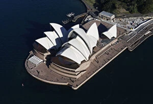 Images Dated 26th August 2013: Tourist visit the Sydney Opera House on a sunny winter afternoon in Sydney