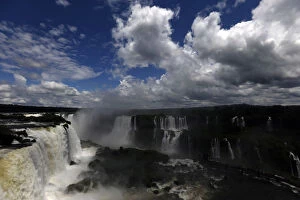 Images Dated 21st February 2014: Tourists look at the Iguazu Falls from an observation platform at the Iguazu National