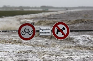 Images Dated 5th December 2013: Traffic signs are seen on the North Sea beach near the town of Norddeich