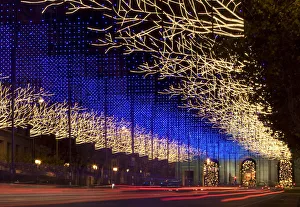 Traffic streams up Alcala street under Christmas lighting in central Madrid Traffic streams up Alcala street under Christmas lighting in central Madrid