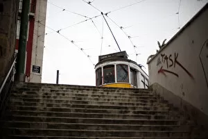 Images Dated 25th March 2013: A tram is seen at the Alfama neighborhood in Lisbon