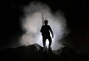 Turkey-backed Free Syrian Army fighter holds a weapon in the town of Tadef in Aleppo Turkey-backed Free Syrian Army fighter holds a weapon in the town of Tadef in Aleppo