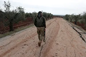 A Turkey-backed Free Syrian Army fighter is seen near Menagh A Turkey-backed Free Syrian Army fighter is seen near Menagh