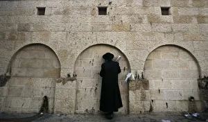 An ultra-Orthodox Jewish man prays outside Rachels Tomb in the West Bank town of An ultra-Orthodox Jewish man prays outside Rachels Tomb in the West Bank town of