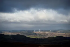 Prints of The hills in the foreground shadows marks the exact border between Ireland and Northern Ireland between County Cavan where windmills are visible and County Fermanagh near Florencecourt Fermanagh Prints: Print of hills in County Cavan and Fermanagh, Northern Ireland