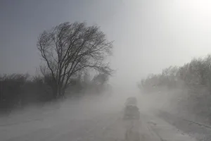 Vehicles drive along a snowy road near the Russian southern city of Stavropol Vehicles drive along a snowy road near the Russian southern city of Stavropol