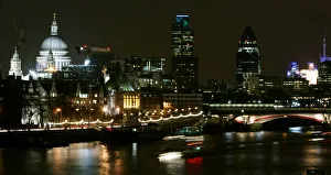 View of St Pauls Cathedral and Swiss Tower known as Gherkin on banks of River Thames View of St Pauls Cathedral and Swiss Tower known as Gherkin on banks of River Thames