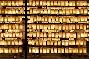 Visitors look at paper lanterns during Mitama Festival at Yasukuni Shrine in Tokyo Visitors look at paper lanterns during Mitama Festival at Yasukuni Shrine in Tokyo