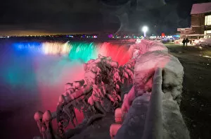 Images Dated 3rd January 2018: Visitors take pictures of ice covered Niagara Falls in Niagara
