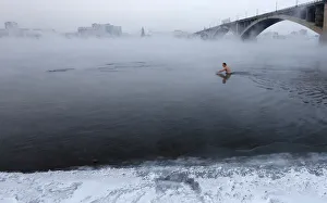 Vladimir Shcherba, a fan of winter swimming, dips to the Yenisei River at air temperature Vladimir Shcherba, a fan of winter swimming, dips to the Yenisei River at air temperature
