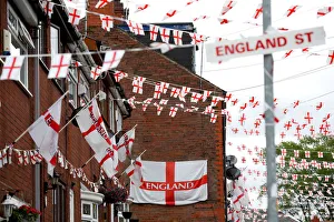 Wales Street in Oldham is temporarily renamed by its residents as England Street as they Wales Street in Oldham is temporarily renamed by its residents as England Street as they