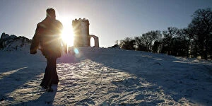 Images Dated 29th January 2004: A WALKER STRIDES THROUGH SNOW TOWARDS THE OLD JOHN MEMORIAL IN BRADGATE PARK