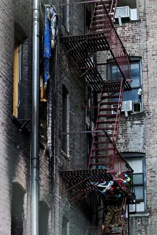 Windows of burned apartments are seen after a fire in a building in Bronx, New York Windows of burned apartments are seen after a fire in a building in Bronx, New York