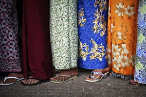 Images Dated 3rd December 2011: Women wait in line to see the sacred Buddhas tooth relic on display at a temple in
