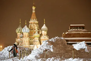 A worker clears and removes snow in Red Square in central Moscow A worker clears and removes snow in Red Square in central Moscow