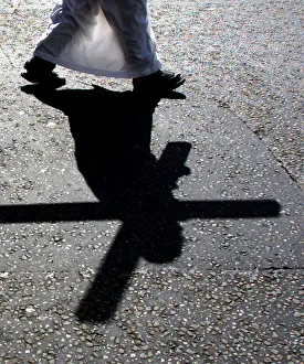 YOANNES HAILELUL CARRIES A WOODEN CROSS THROUGH CENTRAL LONDON AS PART OF THE YOANNES HAILELUL CARRIES A WOODEN CROSS THROUGH CENTRAL LONDON AS PART OF THE