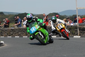 Adam Jones (Kawasaki) and Mark Goodings (Honda) 2011 Southern 100 Adam Jones (Kawasaki) and Mark Goodings (Honda) 2011 Southern 100