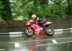 Joey Dunlop Gallery: Joey Dunlop wins the 1998 Lightweight TT