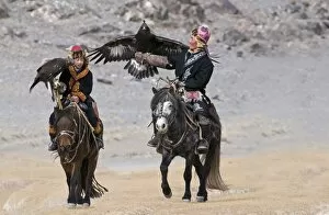 Images Dated 4th October 2008: Eagle hunters on route to the Eagle Hunters festival near Ulgii in western Mongolia October