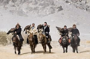 Images Dated 4th October 2008: Kazakh eagle hunters with Golden Eagles on way to the Eagle Hunters Festival in