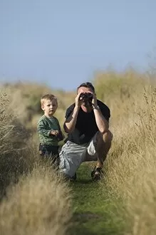 Images Dated 5th August 2006: toddler bird watching Cley North Norfolk August