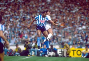 Cyrille Regis Prints: Print of Cyrille Regis vs. Gary Mabbutt at Wembley Stadium (1987)