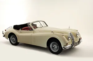 <b class=qtipBold><figcaption>1955 Jaguar XK140</figcaption></b> 1955 Jaguar XK140