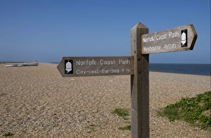Norfolk Coast Path direction sign print on shingle beach