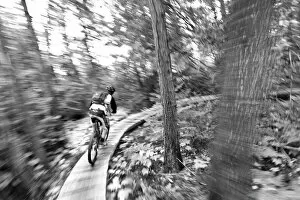 Curving Gallery: Aaron Rodgers mountain biking on the Stairway to Heaven Trail in Copper Harbor Michigan