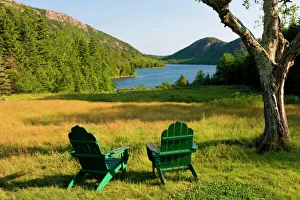 The Adirondack Chairs on the lawn of the Jordan Pond House in Maines Acadia National Park The Adirondack Chairs on the lawn of the Jordan Pond House in Maines Acadia National Park