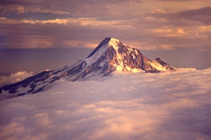 Aerial of Mt. Hood poking through clouds, Oregon Aerial of Mt. Hood poking through clouds, Oregon