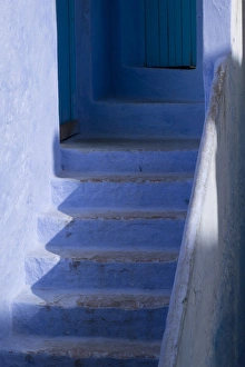 Africa, Morocco, Chefchaouen. Steps leading up into a home Africa, Morocco, Chefchaouen. Steps leading up into a home