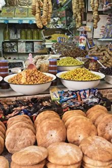 Images Dated 6th April 2015: Africa, Morocco, Moulay Idriss. Market stall selling bread, olives, figs and other