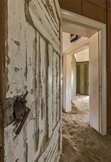 Africa, Namibia, Kolmanskop, Sperrgebeit. View in abandoned sand-filled house. Credit as Africa, Namibia, Kolmanskop, Sperrgebeit. View in abandoned sand-filled house. Credit as