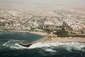 Images Dated 7th September 2009: Africa, Namibia, Swakopmund. Aerial view of the city and bay