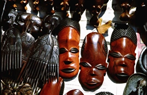 Africa, Zambia, Victoria Falls National Park. Local handicrafts sold at the Falls, masks Africa, Zambia, Victoria Falls National Park. Local handicrafts sold at the Falls, masks