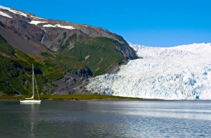 Aialik Glacier calves into Aialik Bay in Kenai Fjords National Park Alaska Aialik Glacier calves into Aialik Bay in Kenai Fjords National Park Alaska