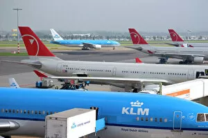 Departure Gallery: Airplanes at Schiphol Airport in Amsterdam, Netherlands