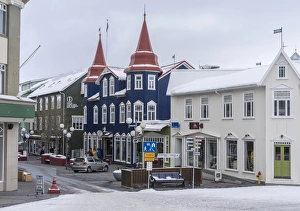 Akureyri during winter, Hafnarstraeti in the town center. The traffic calmed street is kept snow Akureyri during winter, Hafnarstraeti in the town center. The traffic calmed street is kept snow